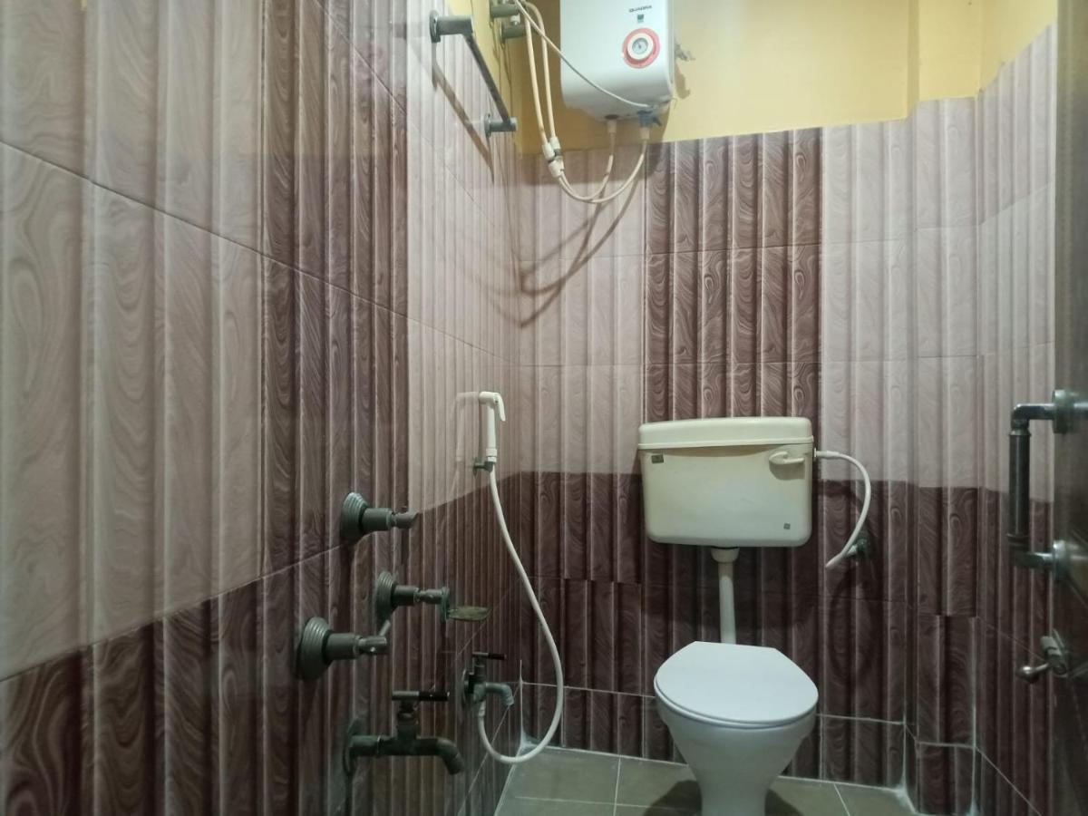 Hotel Gitanjali Māldah Extérieur photo