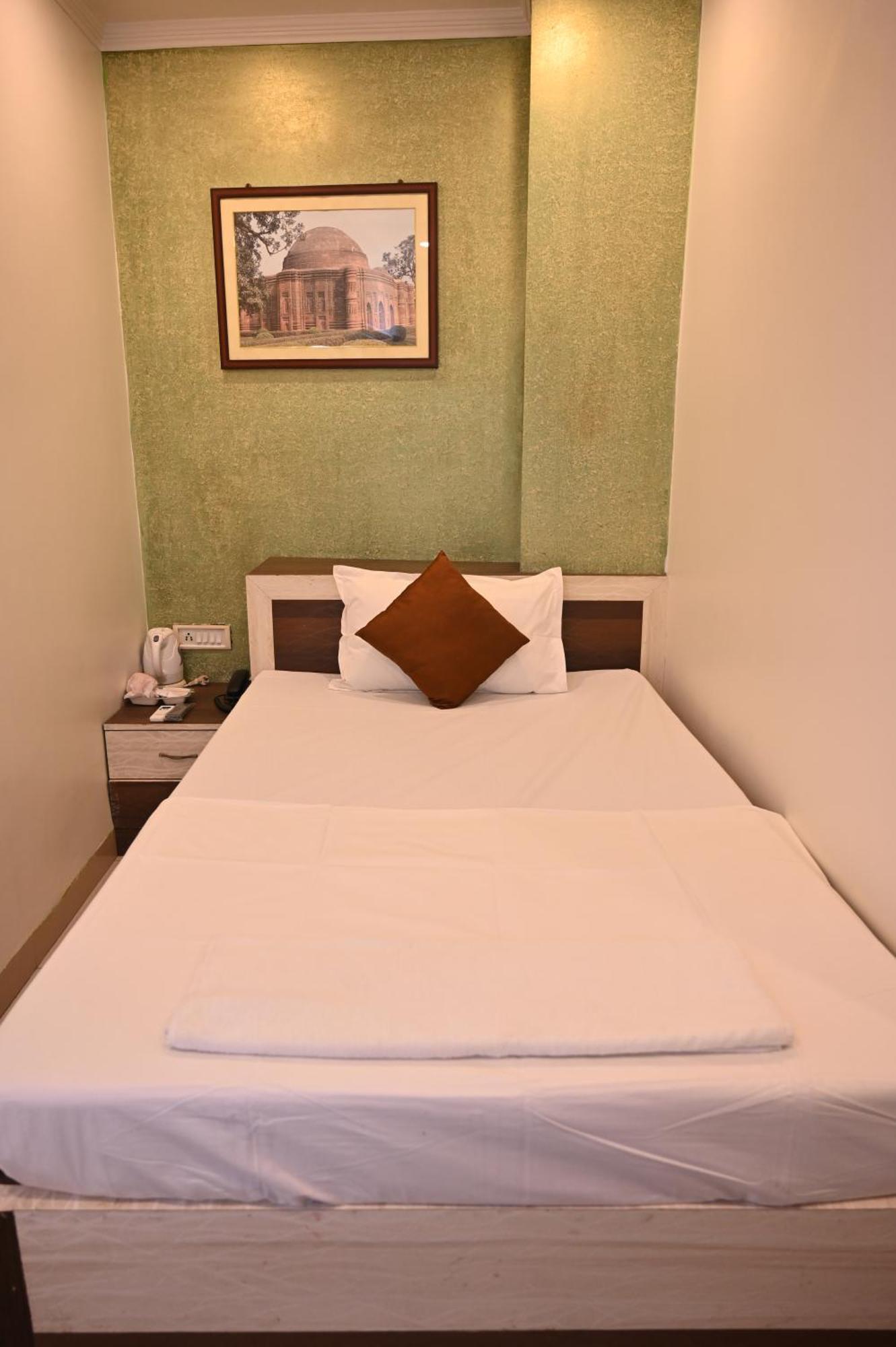 Hotel Gitanjali Māldah Extérieur photo